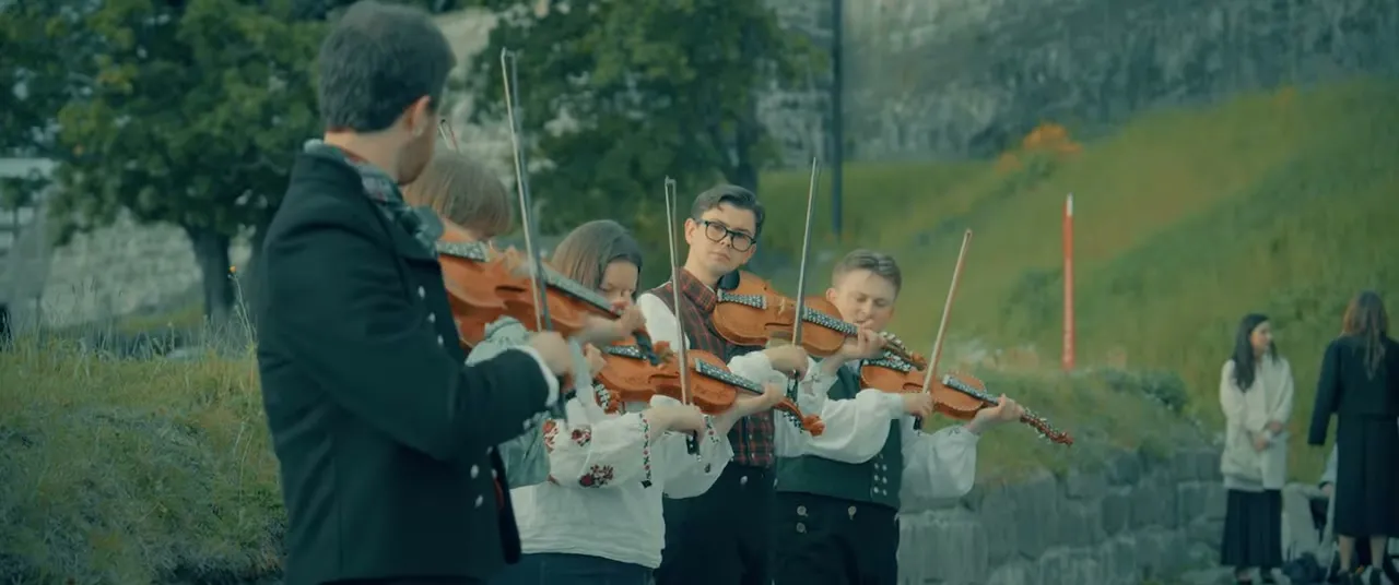 String musicians performing outdoors in Oslo during the 2026 Freedom Forum