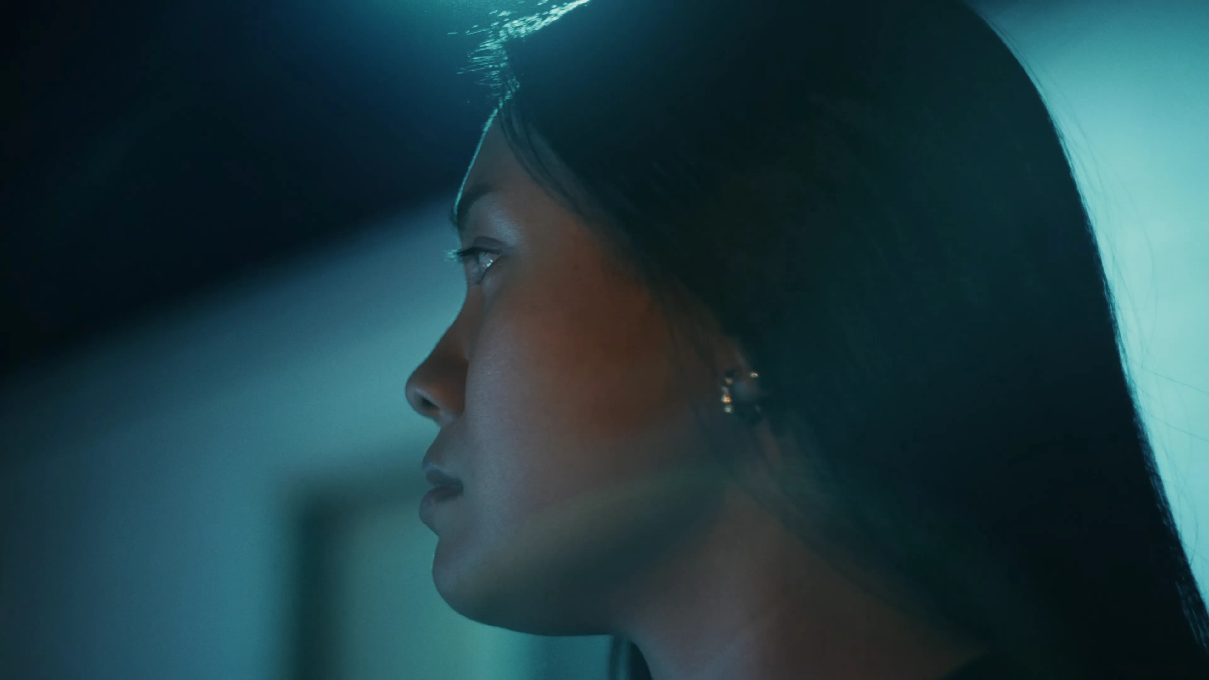 Production frame showcasing the art of cinematography through careful composition and lighting choices